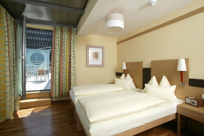 Imagen de la habitación del Hotel Boutique Am Stephansplatz. Foto 7