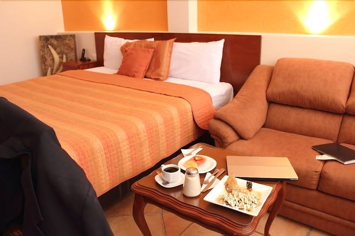 Imagen de la habitación del Hotel Boutique Angelopolis and Business. Foto 5