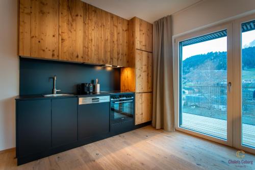 Imagen de la habitación del Hotel Boutique Aparthotel Chalets Coburg. Foto 8