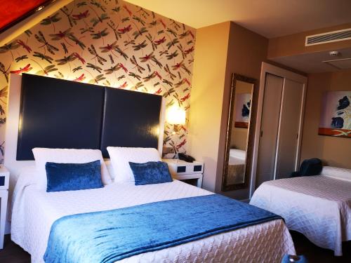 Imagen de la habitación del Hotel Boutique Aquaria Caneliñas. Foto 5