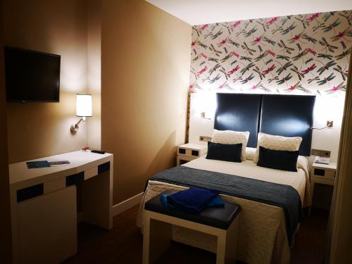 Imagen de la habitación del Hotel Boutique Aquaria Caneliñas. Foto 6