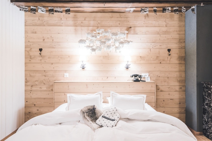 Imagen de la habitación del Hotel Boutique Beau-sejour and Spa. Foto 11