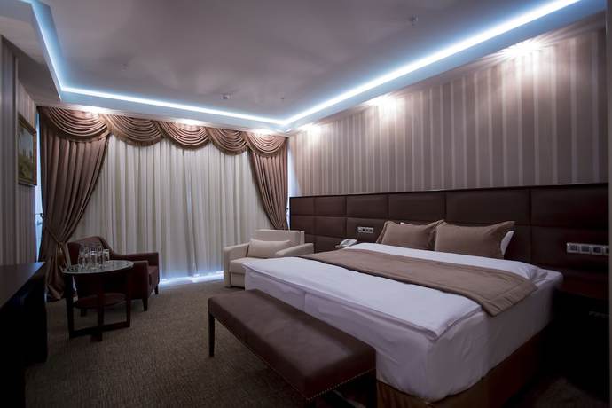 Imagen de la habitación del Hotel Boutique Buta. Foto 11