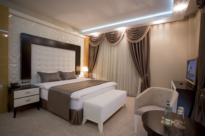 Imagen de la habitación del Hotel Boutique Buta. Foto 12