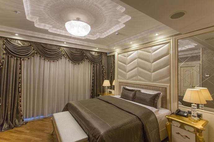Imagen de la habitación del Hotel Boutique Buta. Foto 16