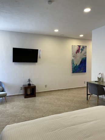 Imagen de la habitación del Hotel Boutique Casa Diamante. Foto 18