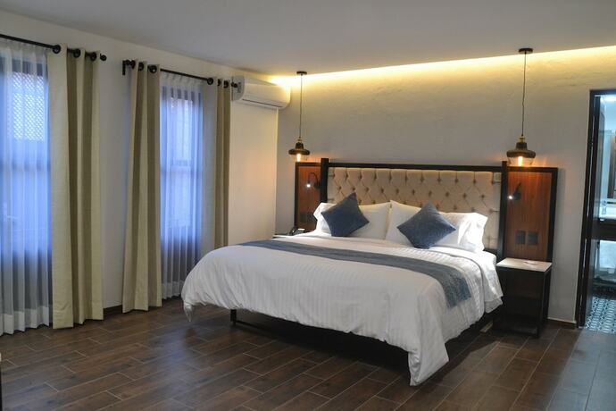 Imagen de la habitación del Hotel Boutique Casa Loreta. Foto 14