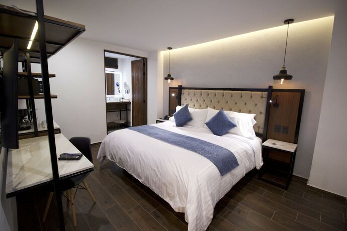 Imagen de la habitación del Hotel Boutique Casa Loreta. Foto 15