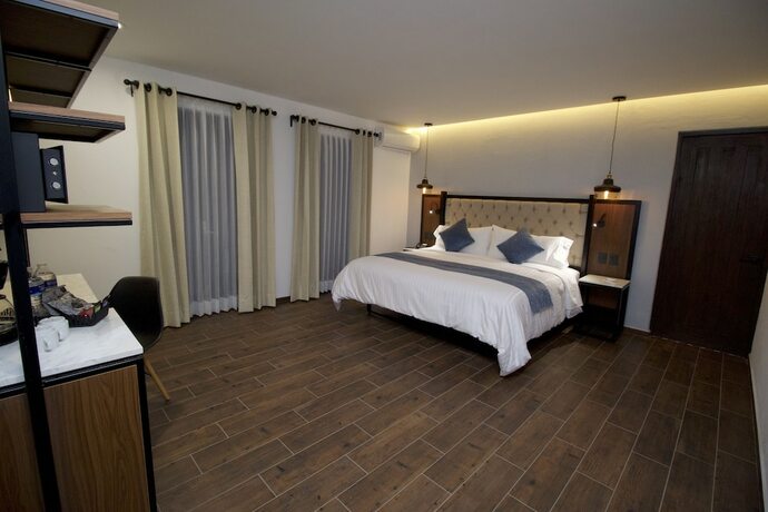 Imagen de la habitación del Hotel Boutique Casa Loreta. Foto 17