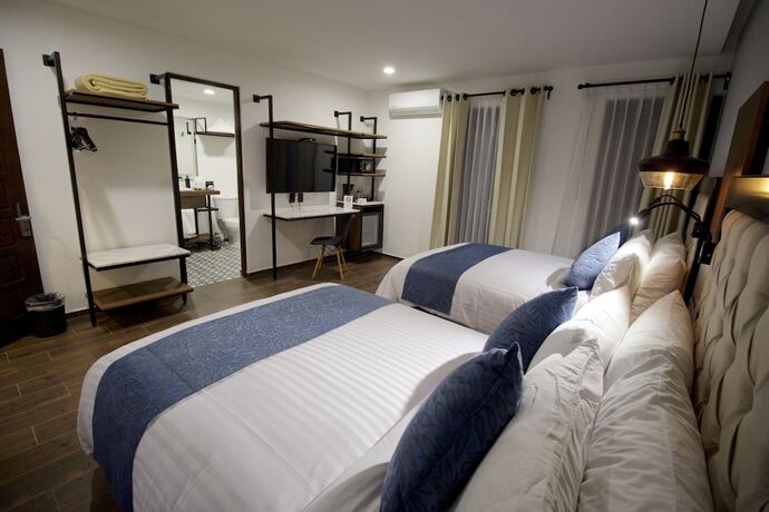 Imagen de la habitación del Hotel Boutique Casa Loreta. Foto 19