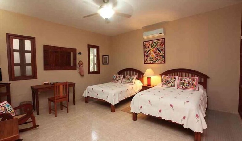 Imagen de la habitación del Hotel Boutique Casa Quetzal. Foto 7