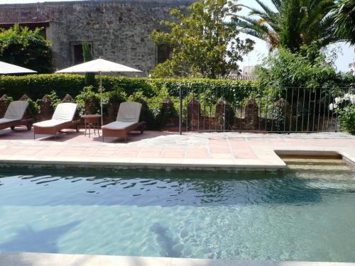 Imagen de la piscina del Hotel Boutique Casa de Orellana. Foto 16