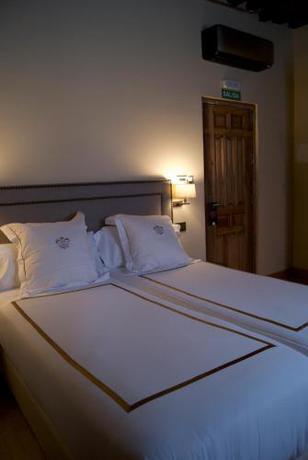 Imagen de la habitación del Hotel Boutique Casa del Comendador. Foto 20