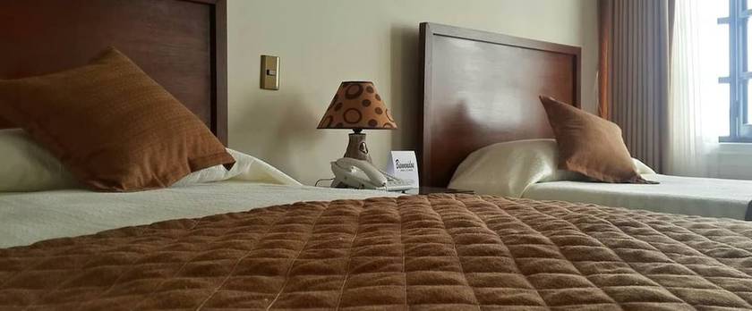 Imagen de la habitación del Hotel Boutique Casamagna. Foto 14