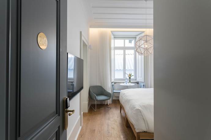 Imagen de la habitación del Hotel Boutique Chiado Suites. Foto 7