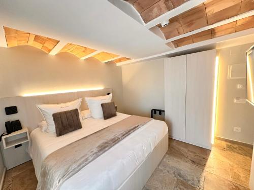 Imagen de la habitación del Hotel Boutique Comtal Empuries. Foto 6