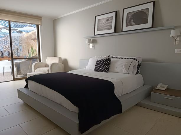 Imagen de la habitación del Hotel Boutique Confort Suites. Foto 2