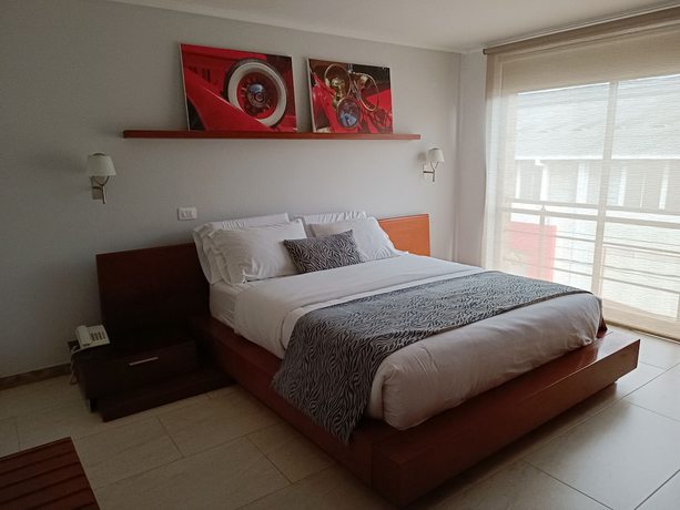 Imagen de la habitación del Hotel Boutique Confort Suites. Foto 5