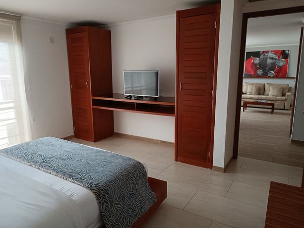 Imagen de la habitación del Hotel Boutique Confort Suites. Foto 6