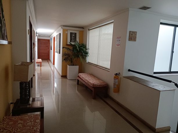 Imagen de la habitación del Hotel Boutique Confort Suites. Foto 7
