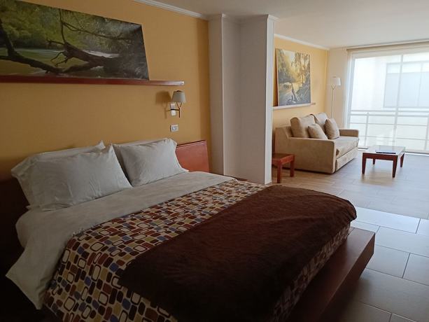 Imagen de la habitación del Hotel Boutique Confort Suites. Foto 10