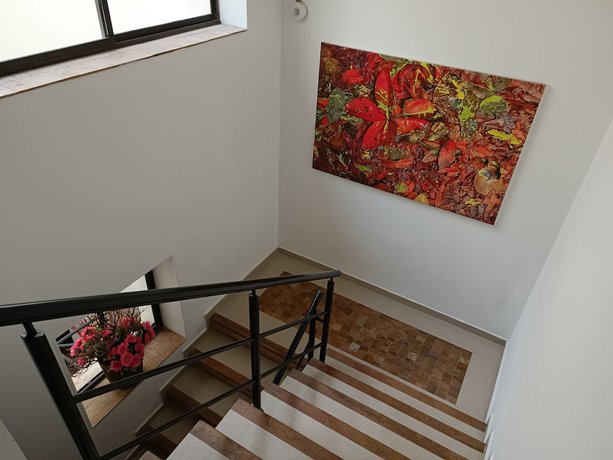 Imagen de la habitación del Hotel Boutique Confort Suites. Foto 11