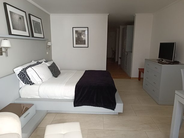 Imagen de la habitación del Hotel Boutique Confort Suites. Foto 15