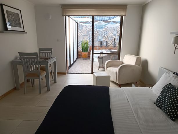 Imagen de la habitación del Hotel Boutique Confort Suites. Foto 19