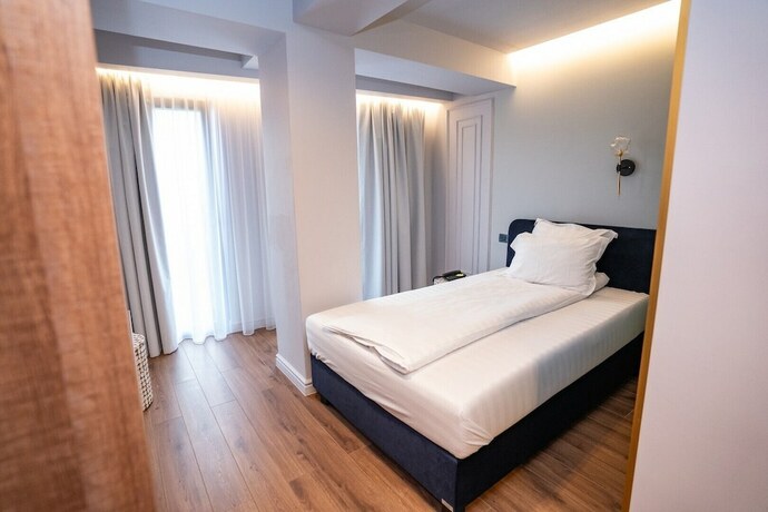 Imagen de la habitación del Hotel Boutique Cosmopolita Timisoara. Foto 13