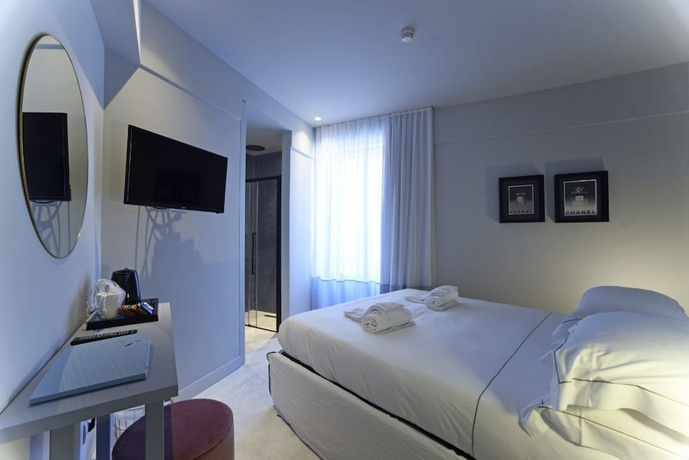 Imagen de la habitación del Hotel Boutique De La Ville Laigueglia. Foto 1