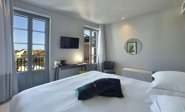 Imagen de la habitación del Hotel Boutique De La Ville Laigueglia. Foto 3