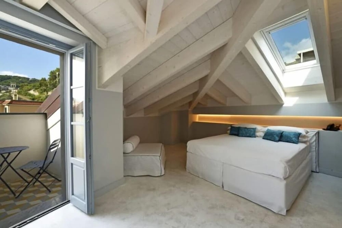 Imagen de la habitación del Hotel Boutique De La Ville Laigueglia. Foto 6