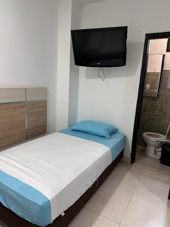 Imagen de la habitación del Hotel Boutique Deluxe. Foto 18