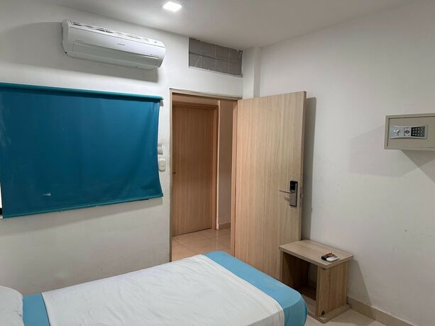 Imagen de la habitación del Hotel Boutique Deluxe. Foto 19