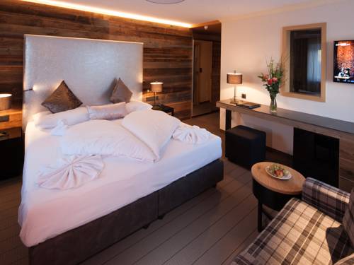 Imagen de la habitación del Hotel Boutique Die Mittagspitze Superior. Foto 5