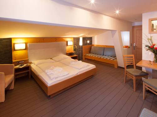 Imagen de la habitación del Hotel Boutique Die Mittagspitze Superior. Foto 6