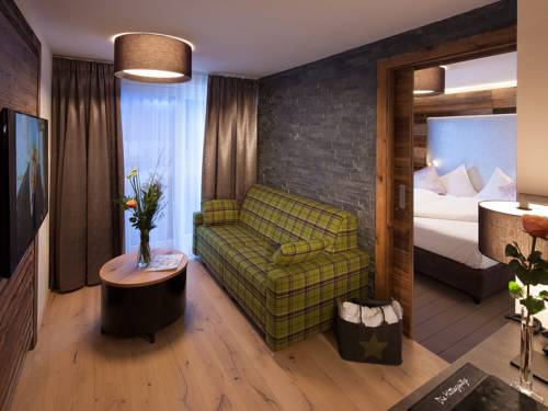 Imagen de la habitación del Hotel Boutique Die Mittagspitze Superior. Foto 11