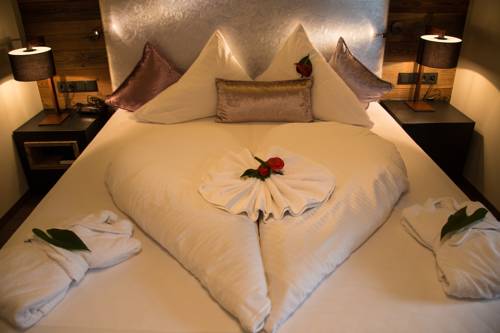 Imagen de la habitación del Hotel Boutique Die Mittagspitze Superior. Foto 12