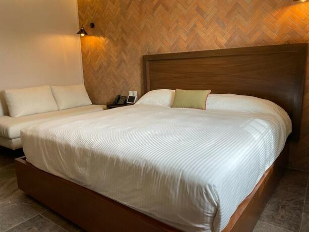 Imagen de la habitación del Hotel Boutique Divino Sol. Foto 15