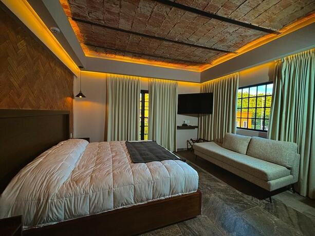 Imagen de la habitación del Hotel Boutique Divino Sol. Foto 17