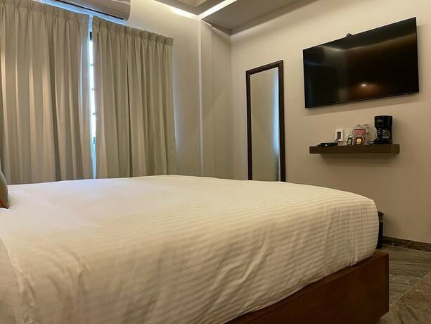 Imagen de la habitación del Hotel Boutique Divino Sol. Foto 19