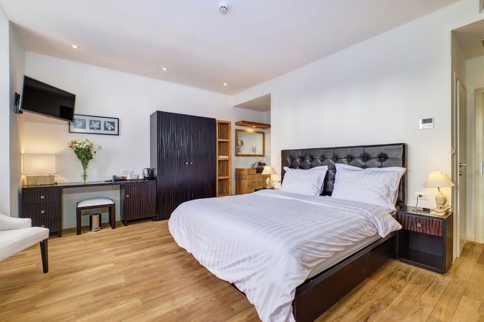 Imagen de la habitación del Hotel Boutique Dolphin Suites. Foto 4