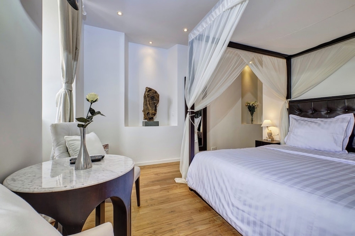 Imagen de la habitación del Hotel Boutique Dolphin Suites. Foto 5