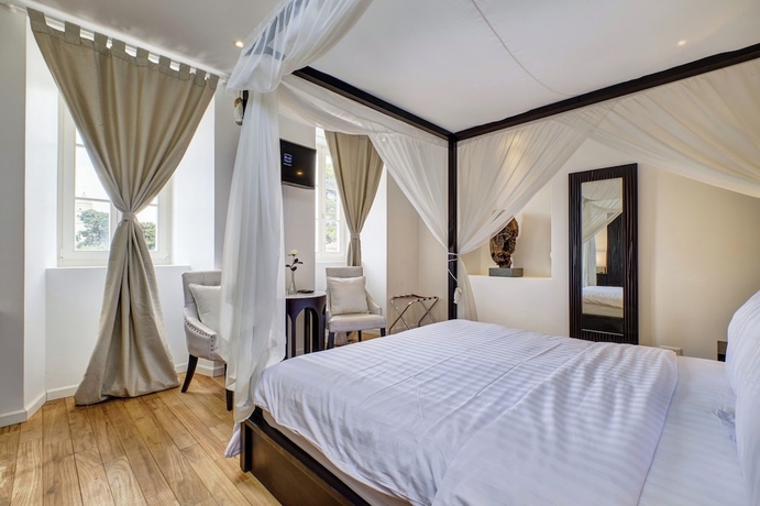Imagen de la habitación del Hotel Boutique Dolphin Suites. Foto 7