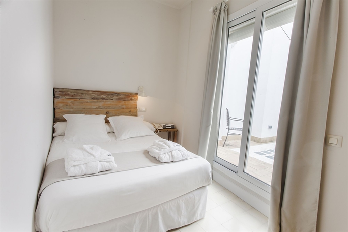 Imagen de la habitación del Hotel Boutique Elvira Plaza. Foto 9