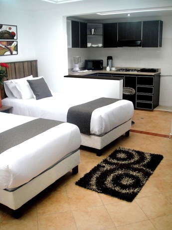 Imagen de la habitación del Hotel Boutique Embajada de la Feria. Foto 2