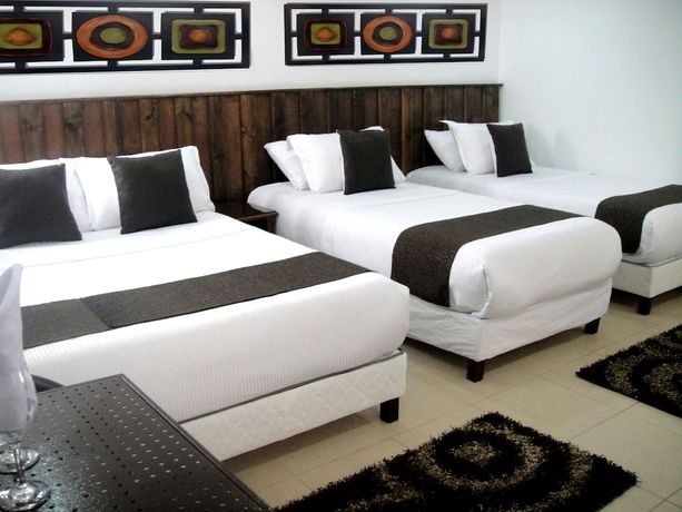 Imagen de la habitación del Hotel Boutique Embajada de la Feria. Foto 5