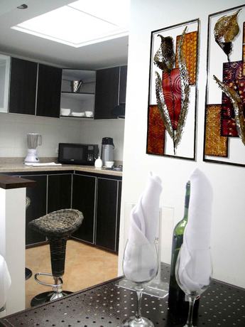 Imagen de la habitación del Hotel Boutique Embajada de la Feria. Foto 6