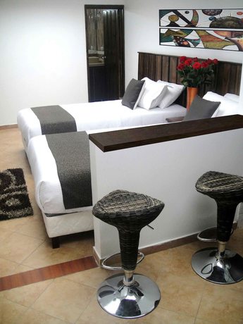 Imagen de la habitación del Hotel Boutique Embajada de la Feria. Foto 14