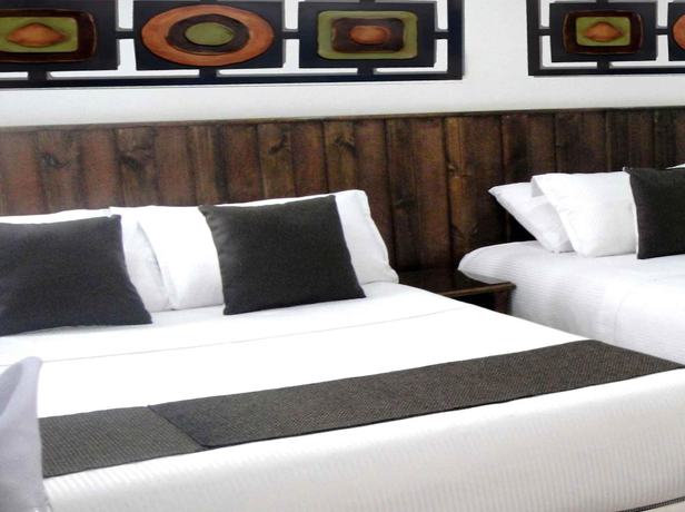 Imagen de la habitación del Hotel Boutique Embajada de la Feria. Foto 16